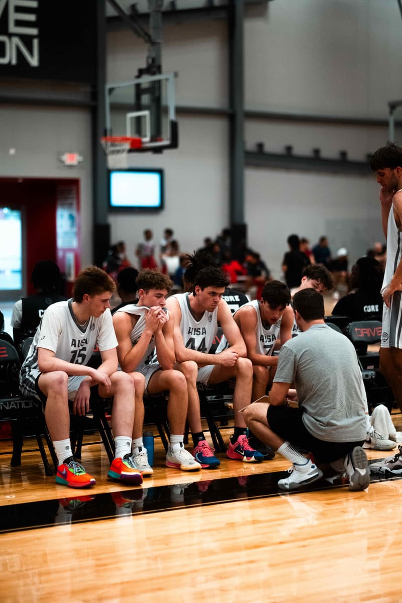 AUSA Hoops coaches talking with players on the sideline