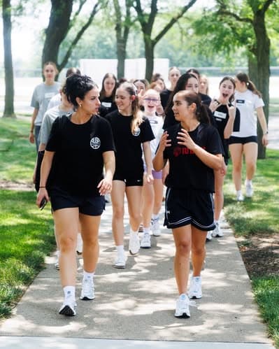 AUSA Hoops girls touring Indiana University with alumna Jemma Moore