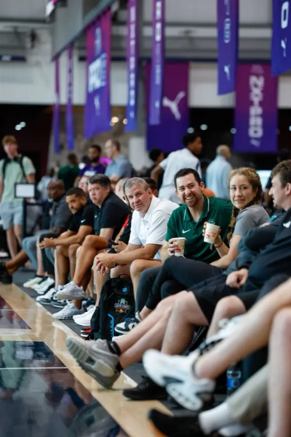 College coaches watching courtside at a US tournament
